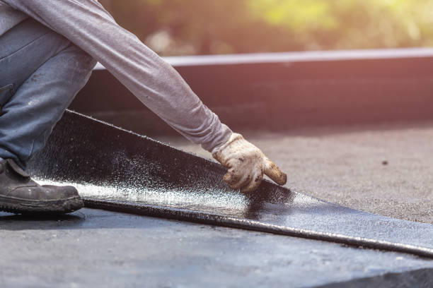 Professional Exterior Waterproofing technician working in Victoria, KS